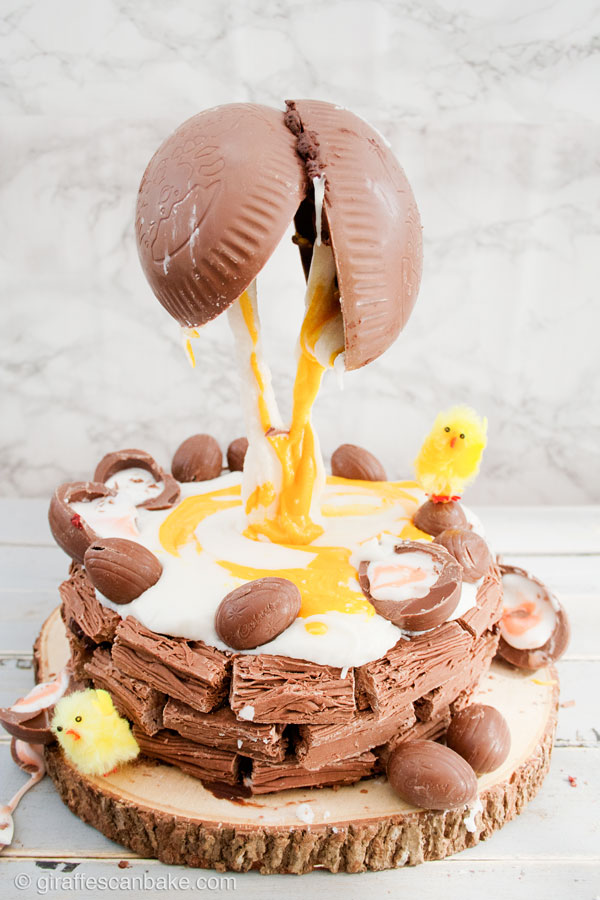 Creme Egg Anti-Gravity Brownie Easter Nest! - A truly decadent showstopper for Easter. Fudgy brownie covered in rich chocolate ganache and sitting in a Cadbury Flake nest. With a cracked chocolate egg spilling Creme Egg filling all over! With a photo guide for how I did it!