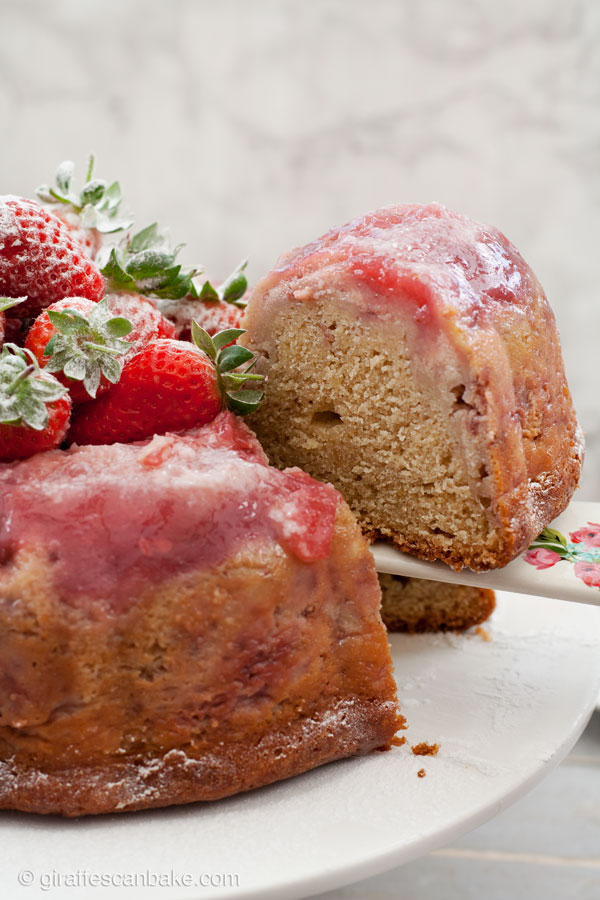Strawberry Cheesecake Upside Down Bundt Cake - a delicious and moist yogurt cake with creamy strawberry cheesecake and fresh strawberries baked right into it. So easy, so yummy and perfect for summer! #YumOfTheMonth #YOTM