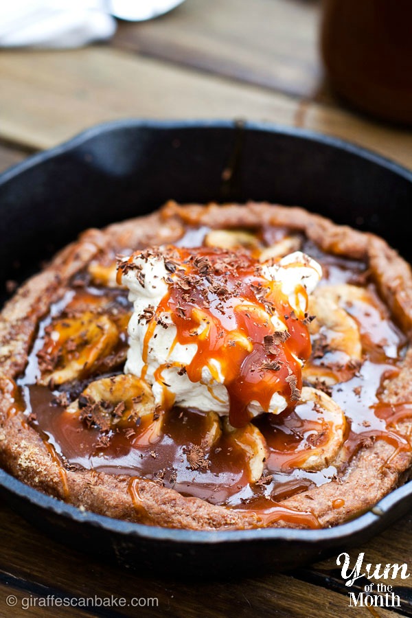 Banana and Salted Caramel Banoffee Galettes - A sinfully indulgent rustic free-form tart. Chocolately pastry is home to sweet bananas and salted caramel, topped with fresh whipped cream and grated chocolate. So simple to make with 5 minute caramel sauce, you won't regret making this!