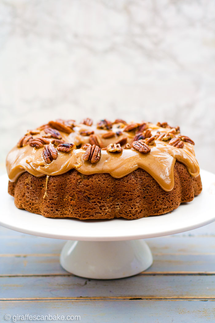 Gluten Free Brown Sugar and Pecan Caramel Bundt Cake - This Gluten Free Brown Sugar and Pecan Caramel Bundt Cake is packed full of pecans and toffee bits, with a moist and tender crumb, smothered in thick, gooey caramel, topped with butter toasted pecans!