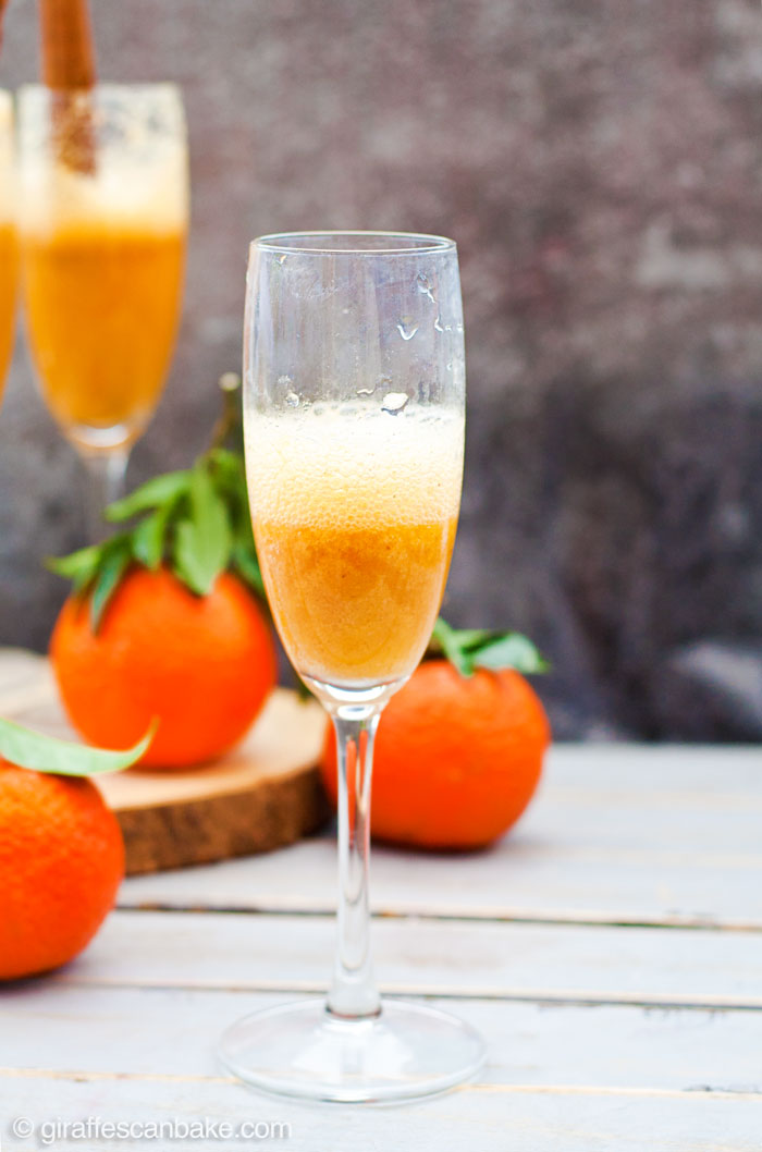 Spiced Clementine Bellini - Three amazing holiday cocktails that are totally delicious, really festive and are quick and easy to make in your Vitamix! Fresh clementine puree blended with cinnamon and nutmeg, topped up with prosecco