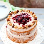 A deliciously tempting mini 6" cake that is naturally gluten and dairy free! Moist hazelnut cake with plum filling and dairy free cinnamon frosting. It's delicious and easy to make, with no oil needed!