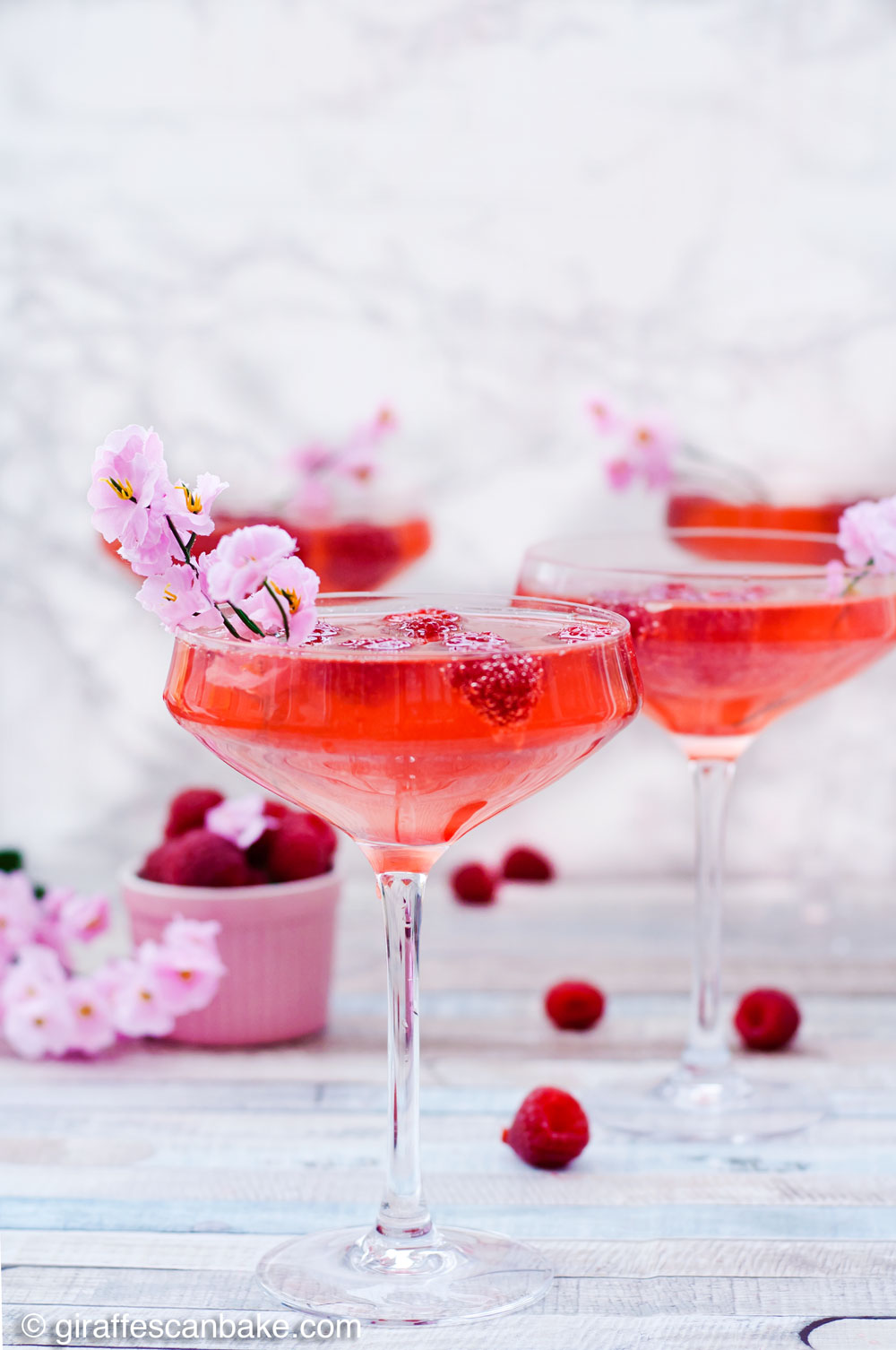 Peach vodka, fresh raspberry syrup and champagne are combined to make this gorgeous Mother’s Day Raspberry Peach Champagne Cocktail. Sweet, bubbly and full of fresh, fruity flavours, this is the perfect cocktail to serve at a Mother’s Day brunch or any special occasion. Don’t have peach vodka to hand? No problem, I have an easy substitute for you! So raise a glass and let’s call a toast the wonderful Mother figures in our lives.
