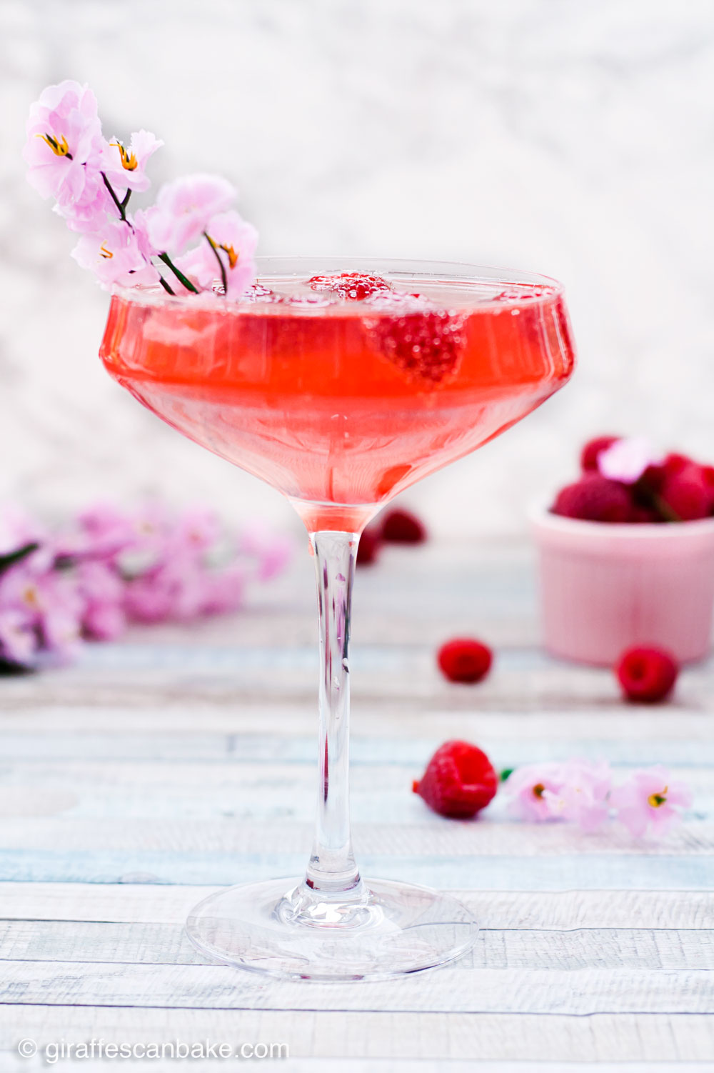 Peach vodka, fresh raspberry syrup and champagne are combined to make this gorgeous Mother’s Day Raspberry Peach Champagne Cocktail. Sweet, bubbly and full of fresh, fruity flavours, this is the perfect cocktail to serve at a Mother’s Day brunch or any special occasion. Don’t have peach vodka to hand? No problem, I have an easy substitute for you! So raise a glass and let’s call a toast the wonderful Mother figures in our lives.