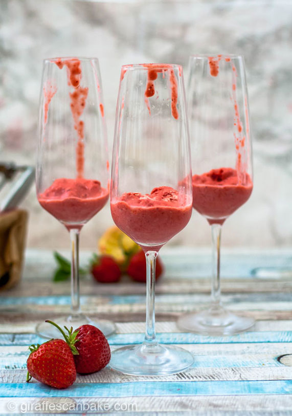 Strawberries and Cream Sorbet Mimosas - These summery and delicious Strawberries and Cream Sorbet Mimosas are so much fun. They're easy to make, with homemade sorbet, and are perfect for brunch, a bridal shower, or a girly night! Pop open the champagne and get to sippin'! 